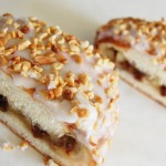 Bear Claw 1 Vanilla Frosting and Peanut Topped