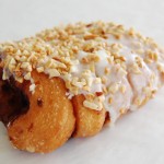 Bear claw Raisins, Apples, and Cinnamon topped with frosting and Peanuts