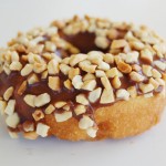 Chocolate Frosted Peanut Cake Chocolate Frosted Peanut Topped White Cake Donut