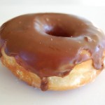 Chocolate Raised A raised glazed donut dipped in chocolate frosting.